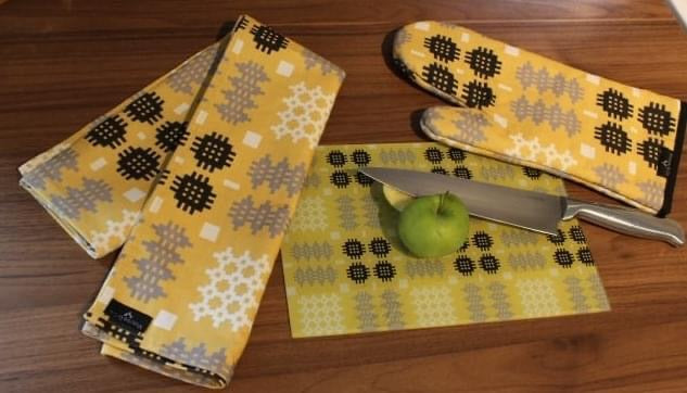 Welsh Tapestry print glass cutting / chopping board - Mustard